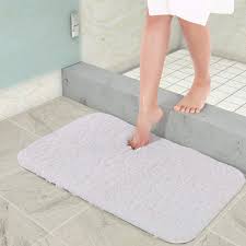 I keep a towel on the ground outside the shower, and a cheap $5 ikea mat in front of the sink (my bathroom is the coldest room in the house in the winter). 24x16 Lifewit Bathroom Rug Bath Mat Non Slip Rubber Microfiber Soft Water Absorbent Thick Shaggy Floor Mats Machine Washable White Bath Bath Rugs Florent Dejardin Fr