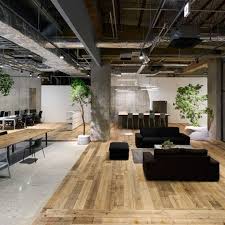 Multi Levelled Surfaces Of Concrete Wood And White Gravel Define The Different Working Areas W Modern Office Design Office Interior Design Modern Office Space