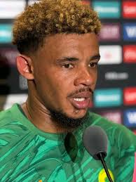 Williamson walking away before the second goal scored. No effort to reach  winger