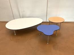 Each table offers a single compact drawer to keep your space organized, along with an open shelf to display your favorite decorations or store extra large items. Lot Art Cappelini Progetto Ogetto Line Set Of Three Coffee Tables With