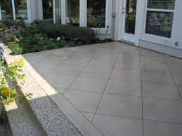 Concrete patios can add value and beauty to any outdoor living space. How Much Does A Concrete Overlay Cost In Dallas Ft Worth Poured Concrete Patio Backyard Patio Backyard Remodel