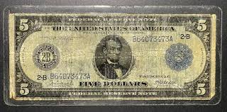 Freeing a laminated or plasticized banknote