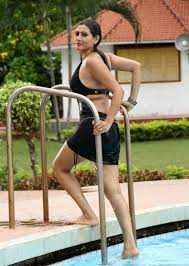 Beauty Galore HD : Rishika Swimsuit in the pool