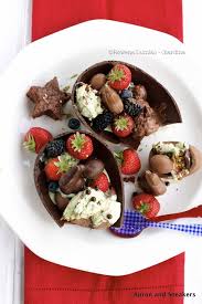 55 best easter desserts for the sweetest end to your spring meal. Easter Chocolate Egg Ice Cream And Berry Dessert Easter Eggs Chocolate Easter Egg Dessert Berry Dessert