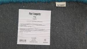 Who is the only manufacturer of area rugs in the world? Area Rug Blue W White Accents Pier 1 5 Ft X 8ft 100 Wool Minor Signs Of Wear Oahu Auctions