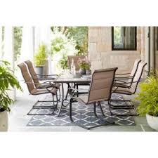 Hampton Bay Cambridge 7 Piece Brown Wicker Outdoor Patio Dining Set With Standard Midnight Navy Blue Cushions 65 7148b7 The Home Depot Outdoor Dining Set Patio Dining Furniture Patio Dining Chairs