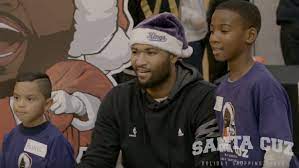 Demarcus cousins presents boogie's comedy slam. Demarcus Cousins Aka Santa Cuz Takes 200 Kids Shopping Hooped Up Kids Shop Kids Shopping