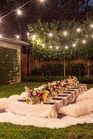 Tips for throwing the perfect garden party. A Bohemian Backyard Dinner Party Backyard Dinner Party Boho Backyard Dinner Party Garden Party Decorations