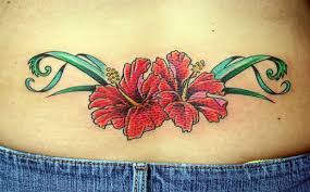 Flower tattoo for women on back. Lower Back Flower Tattoo Designs