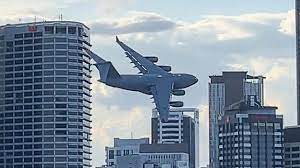 The plane was flying above the east river past the queensboro bridge toward restricted airspace. Plane Flies Between Buildings Youtube