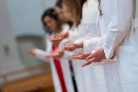 Inaugural white coat ceremony signifies departure of 11 DNP candidates to  clinical rotations