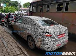 Latest spy images reveal the design and the interior details of the sedan. Skoda Slavia Rapid Successor Key Details Revealed Via Spyshots