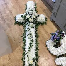 Maybe you would like to learn more about one of these? Funeral Crosses Delicate Daisy