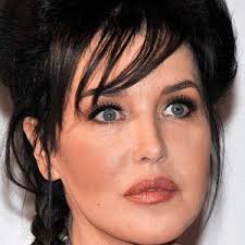 Attitude d'isabelle adjani le regard perdu, assise au milieu de très nombreux serpentins dans une scène du film 'barocco' d'andré. Isabelle Adjani Bio Family Trivia Famous Birthdays