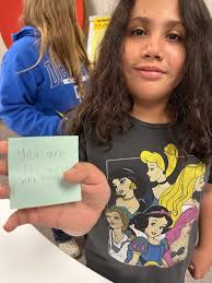 Basketball Coach Ken Hefner speaks to students