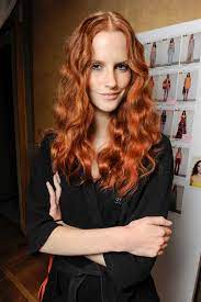 A Tumbling Mane Of Curly Auburn Hair Wordreference Forums