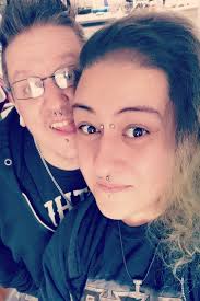 Woman lives with husband and boyfriend she met