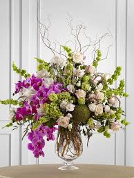 Orchids Roses Hydrangeas And Bells Of Ireland Love The Moss Sphere Studded W Large Flower Arrangements Large Floral Arrangements Fresh Flowers Arrangements