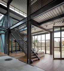 Contemporary Industrial House Features An Expressive Interior Of Raw Steel In 2020 Steel Building Homes Industrial House Steel Structure Buildings