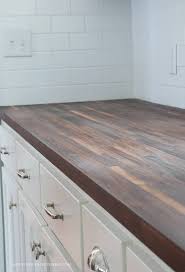 Butcher block counter tops in blue and white kitchen. How I Protect My Butcher Block Countertops Serving Up Southern