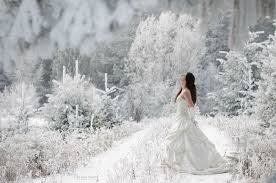 For a winter holiday photoshoot, pair creamy shades of white with bold colors like scarlet red and royal purple. 51 Wonderful Winter Wedding Photography Ideas Sortra