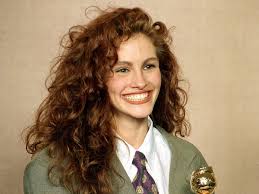This is classic girly 80s hairstyle where the bangs are blunt and the hair is settled in two messy ponytails. Celebrity Hairstyles From The 80s You Completely Forgot About