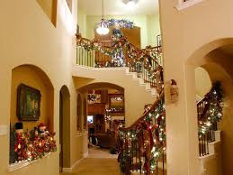 To dress your staircase for the holiday season, embellish a handmade garland of evergreen roping with additional greens and sprigs of pepperberries, then hang a couple of stockings with care. Our Favorite Holiday Ideas From Rate My Space Diy