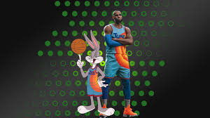 A rogue artificial intelligence kidnaps don cheadle and the cast of space jam: Maxi Geek