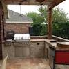 Stucco and tile top with round fire pit. 1