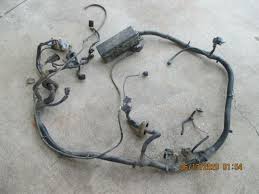 Lift front of jeep on ramps or stands, remove 4 nuts which hold the transmission to the skid plate. 2000 Jeep Wrangler Engine Wiring Harness Wiring Diagram Home Left Reference Left Reference Volleyjesi It