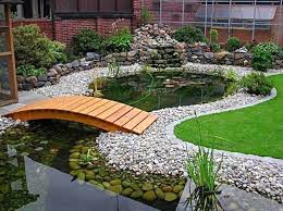 Landscaping Ideas For A Low Maintenance Yard Courtesy Of Chris Peyton Lambton Landscaping Backyard Fro Fish Pond Gardens Ponds Backyard Pond Landscaping