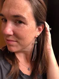 Simple silver earrings for August pop up