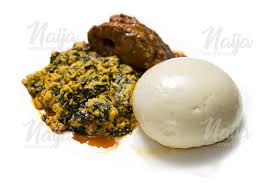 Egusi soup is a nigerian delicacy usually served with pounded yam, eba or fufu. Pounded Yam With Egusi And Fish Naija Photo Stock