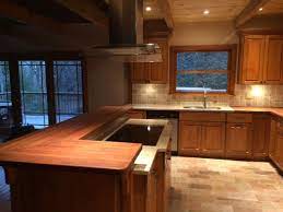 Custom teak wood countertop, designed for use as a curved raised kitchen bar grothouse for a kitchen in denver, colorado with durata waterproof finish. Wood Countertop And Butcher Block Countertop Gallery
