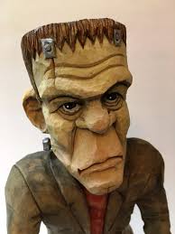 Small garden statue with farmer figure