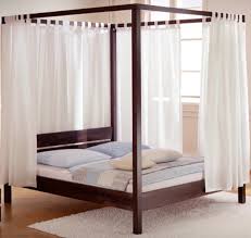 Shiny metallic canopy bed with just a frame. Canopy Bed Metal Canopy Bed Wood Dormissima