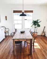 Dining Room Design Idea With Blinds Wood Table And Indoor Plant Farmhouse Dining Table Dining Room Design Farmhouse Dining Room