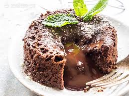 Quick And Easy Yet Decadent Mug Muffin Filled With Dark Chocolate This Sugar Free Treat Can Be Made In Just 5 Minut Lava Cake Recipes Lava Cakes Keto Mug Cake