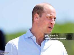 Prince William, Prince of Wales visits Fistral Beach