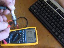 Screwdriver with a wooden or plastic handle. Testing A Spark Plug With A Multimeter Youtube