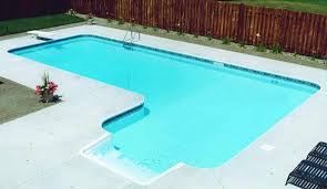Small indoor swimming pool with blue tile and slate floors and walls #swimmingpool #smallpool #custompool. L Shaped Kidney Pools Mn