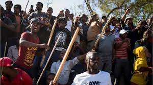 South african scientists said they are working with the world health organization to investigate a new variant of coronavirus, currently surging in many parts of the country. South African Crowds Walk Out Of Anti Xenophobia Speech Bbc News