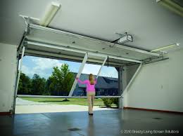 Garage Screen System Lifestyle Garage Screen Door Contains A Retractable Roll Up Passage Door Garage Screen Door Garage House Roll Up Garage Door