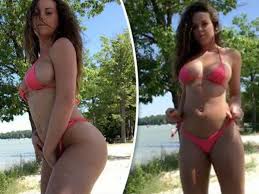 Busty babe flaunts all-natural body in tiny bikini with a big helping of  side-boob - Daily Star