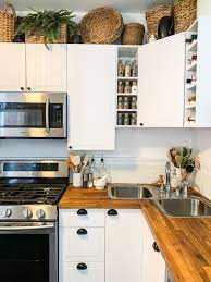 Decorating Above Kitchen Cabinets With Baskets And Plants Top Kitchen Cabinets Decor Above Kitchen Cabinets Decorating Above Kitchen Cabinets