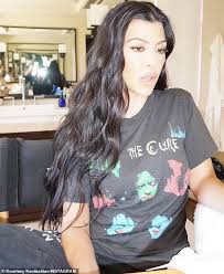 Play travis barker and discover followers on soundcloud | stream tracks, albums, playlists on desktop and mobile. Kourtney Kardashian Shows Her Music Tastes By Modeling The Cure Shirt Daily Mail Online