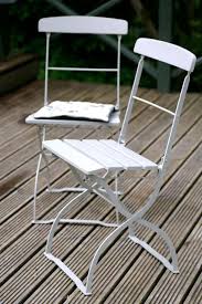 Pull Up A Seat Our Favorite Folding Metal Bistro Chairs Starting From 25 Gardenista Outdoor Folding Chairs Outdoor Furniture Chairs Folding Chair