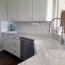 Snow White Kitchen Cabinets Kitchen Cabinets Kitchen And Bath White Kitchen