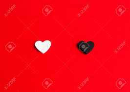Black heart on the red hearts background. Small White And Black Heart On A Vivid Red Background Valentine S Stock Photo Picture And Royalty Free Image Image 95386724