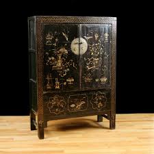 Chinese ming style hand painted red and brown lacquered cabinet with carved sides, drawer and doors. Antique Chinese Qing Cabinet With Original Polychrome Lacquer Bonnin Ashley Antiques Miami Fl